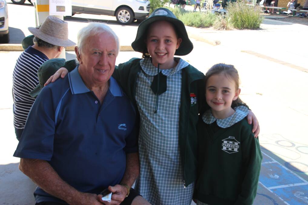 FUN WITH POP: Arla and Pippa Quigley enjoy time with their pop Peter Foote at Grandparents Day celebrations at Parkview Public School. 