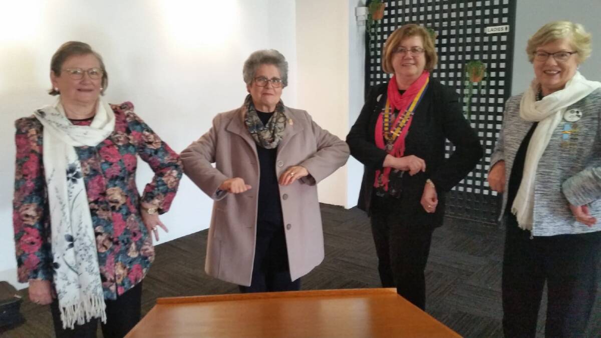 THE NEW NORM: Joy Norrie, Tonetta Fiumara, Carol Chiswell and Jan Munro practice the 2020 COVID-safe "handshake". Photo: Contributed 