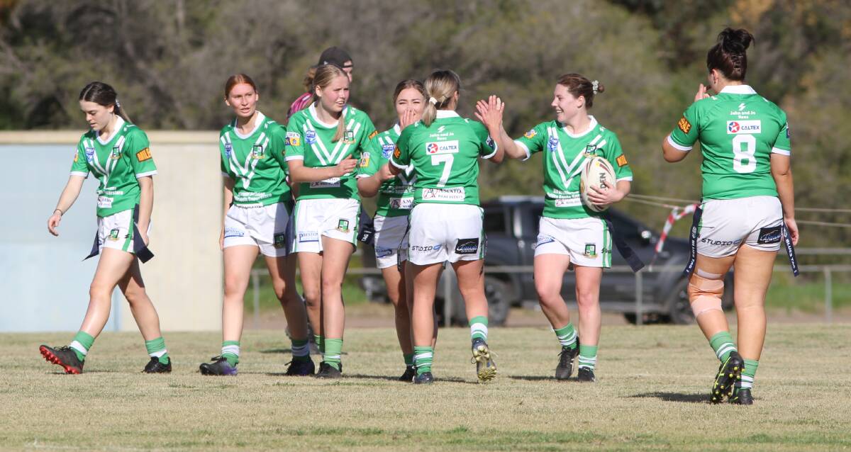 STAYING TOGETHER: The Greens league tag side celebrates a try during their last game against Yanco-Wamoon. Photo: Talia Pattison