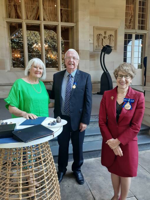 MEDAL MOMENT: Mary and Peter McPhee with Governor of NSW Margaret Beazley. Photo: Contributed 