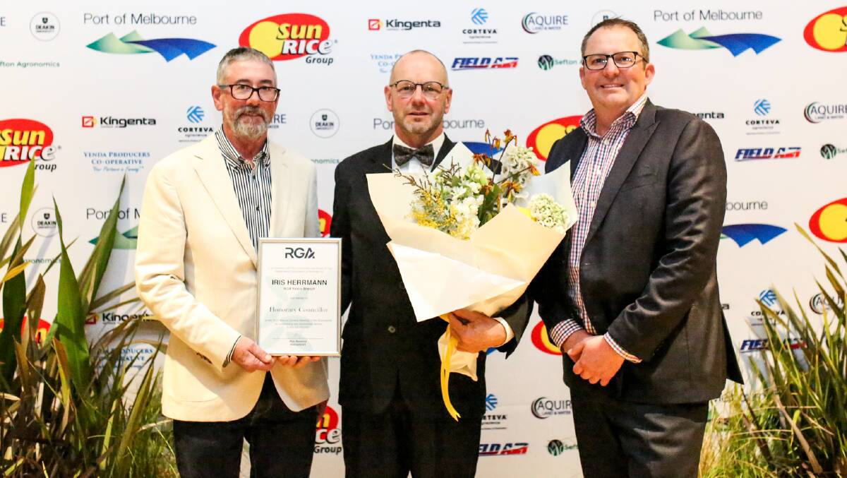 ACCOLADE: RGA Yanco branch president Scott Williams and RGA president Rob Massina present Peter Herrmann (middle) with the RGA honorary councillor award. Peter is the grandson of the award recipient Iris Herrmann. Photo: Emma Cross