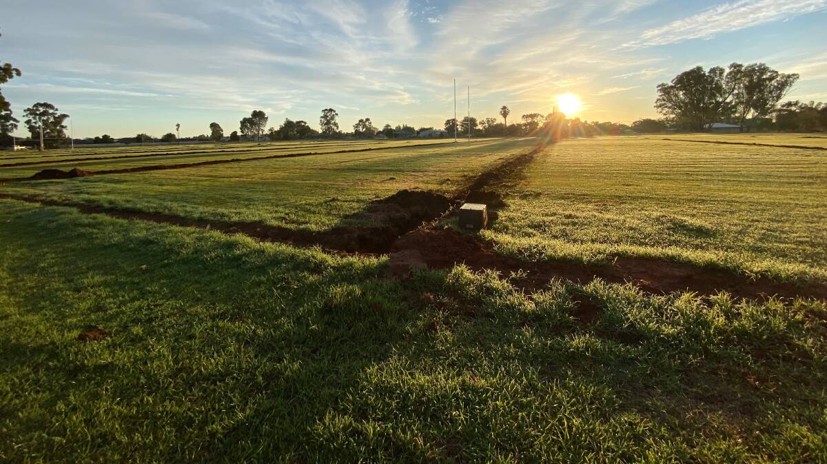 STARTED: Work to install a new irrigation system at the Leeton High School ovals is well underway. Photo: Talia Pattison