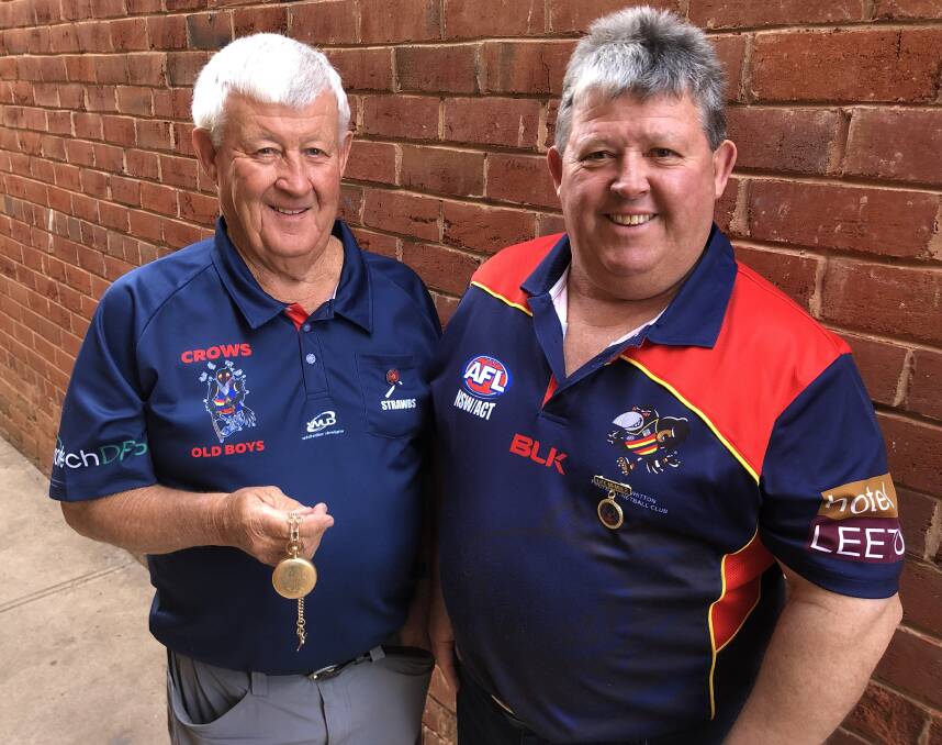 PROUD: Barry (left) and Garry Swasbrick are life members of the Leeton-Whitton Football and Netball Club. Barry's father William Thomas Swasbrick is also a life member. Photo: Talia Pattison 