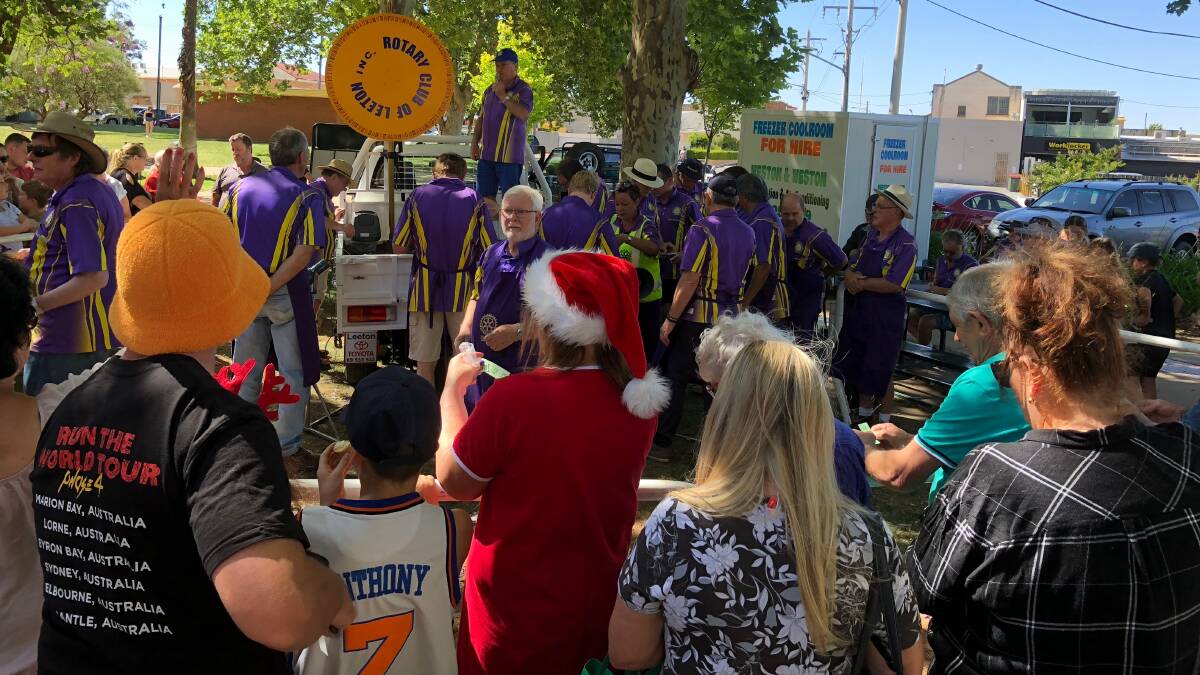 CHRISTMAS LUNCH: The Rotary hams carnival is popular among residents. Photo: Talia Pattison