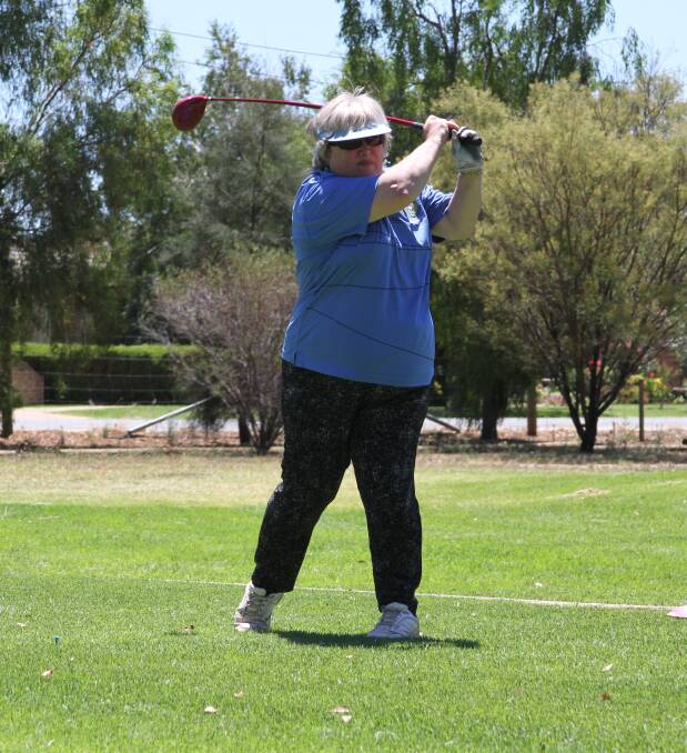 ON THE COURSE: Chrissy Smith watches to see where her shot lands at the Leeton golf course recently. Photo: Ron Arel 