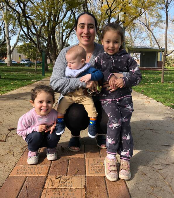 SET: Leeton Farmers and Makers Market's secretary Maria Lawrence with children Ella, Michael and Ruby are all ready for the event to return. Photo: Talia Pattison