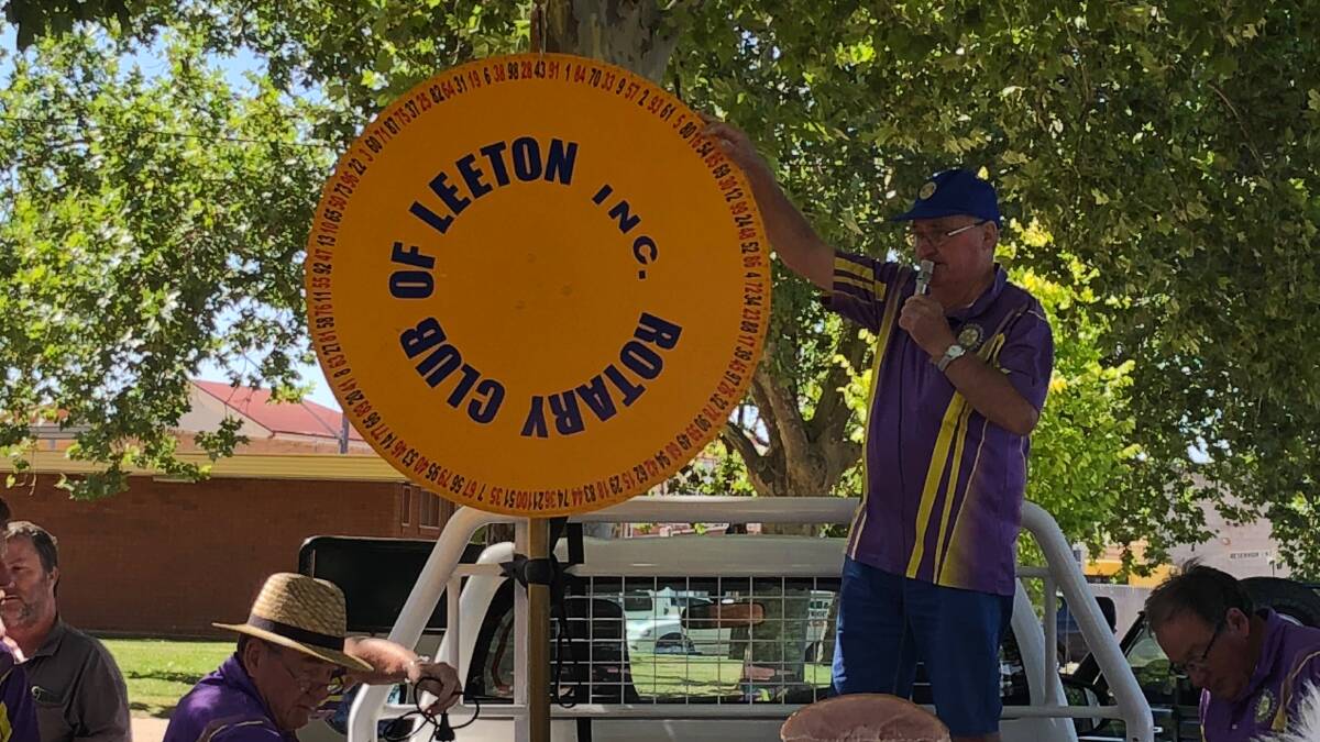 SPIN: Neil Ditton leads the Rotary hams carnival at Light Up Leeton. Residents will be able to try their luck again in 2021. Photo: Talia Pattison 