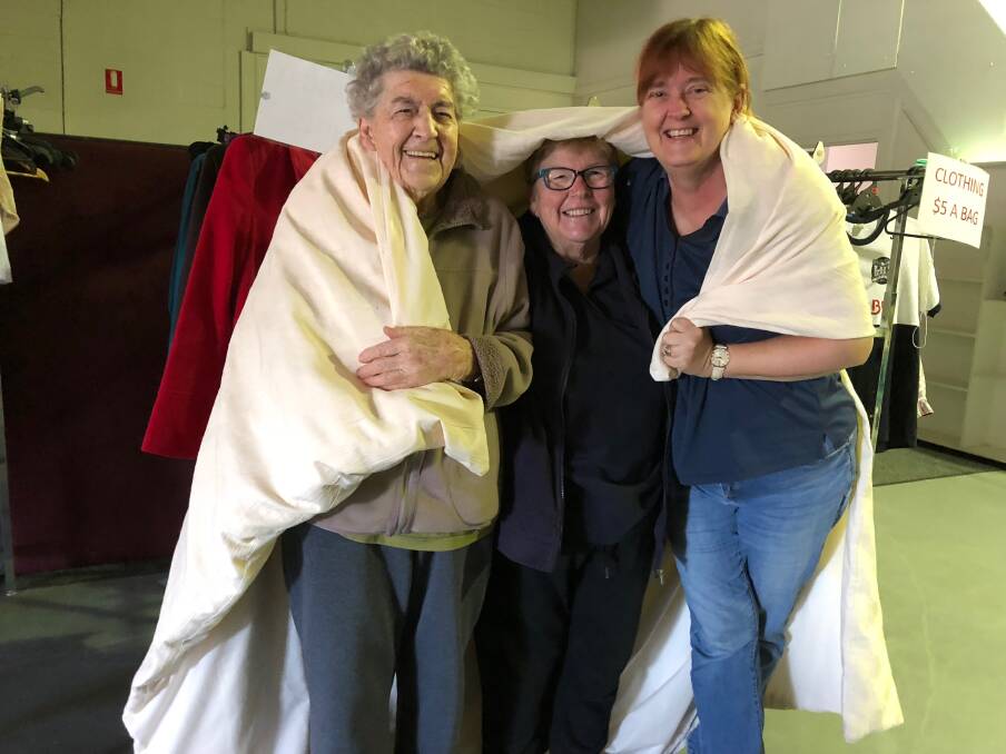 WARM UP: Phyllis Tilker, Marie Jackson and Wendy-Sue Swann are nice and cosy, but it's not that way for everyone. Photo: Talia Pattison 