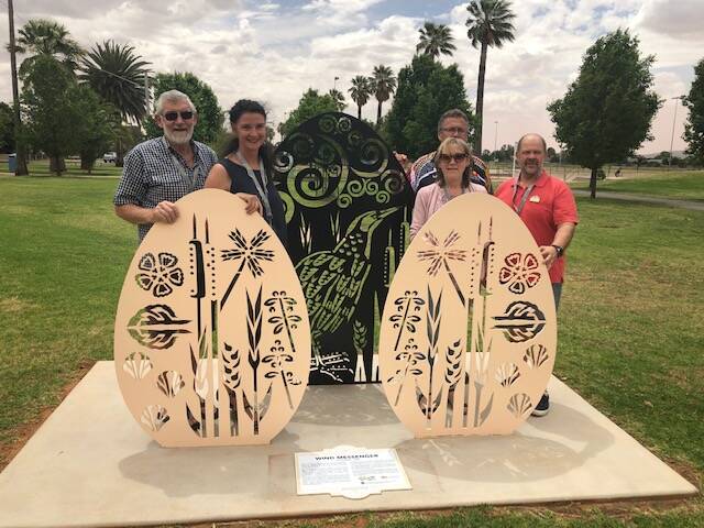 The launch of the trail included stops at each of the pieces of work, including this one at Rotary Park. 