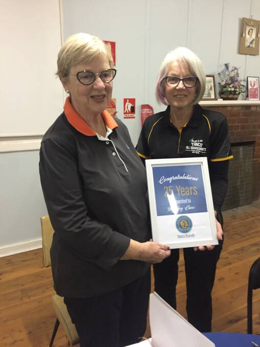 THANK YOU: Bev Clare (left) is congratulated by Tracey Hamilton on reaching 25 years of service with the Yanco Country Women's Association. Photo: Contributed
