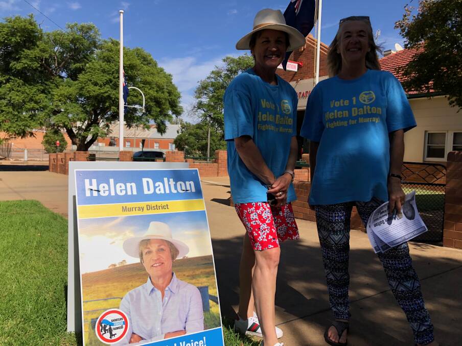 FINAL COUNTDOWN: Shooters, Fishers and Farmers candidate Helen Dalton (left) with supporter Debbie Buller at pre-polling in Leeton on Saturday morning. Photo: Talia Pattison 