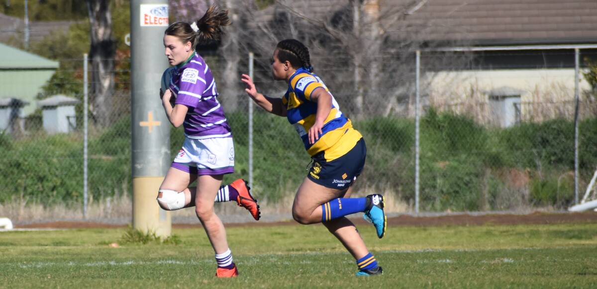 RUN: Emily Poole attempts to get the ball away from her Albury opponent during the Dianas' last home game recently. Photo: Liam Warren