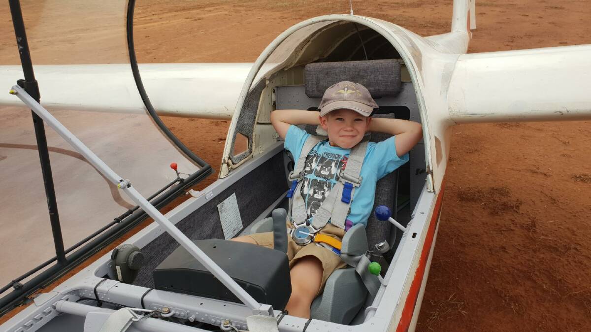 LAID BACK: Leeton's Ashton Roden was quite relaxed before going up for his first flight in a glider with grandfather Kevin Roden. Photo: Contributed 