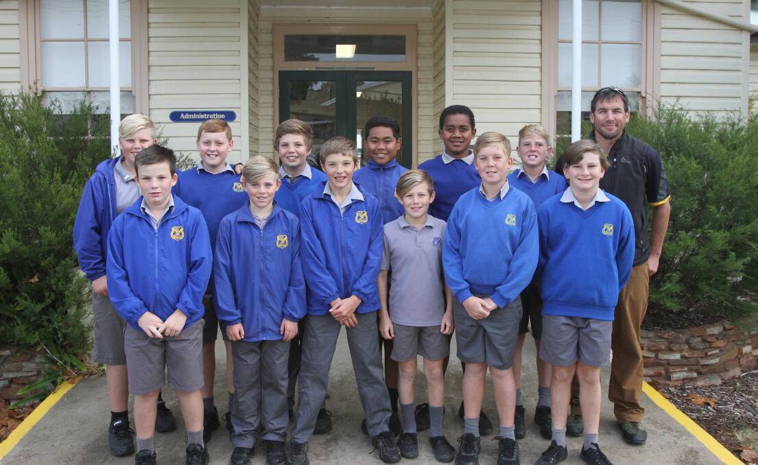 EXCITED: The Leeton Public School rugby union team and coach Kris Sales ahead of this weekend's curtain raiser. Photo: Talia Pattison 