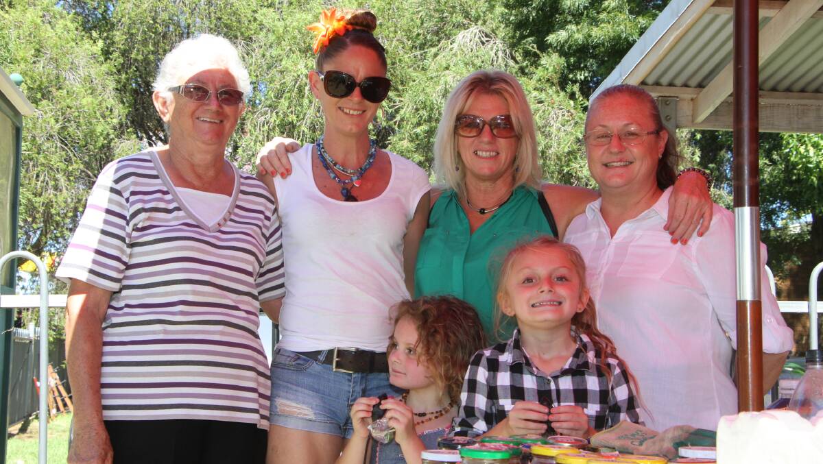 FUN: Lorraine O'Connell, Tammy and Chris Weymouth, Wendy Heffer, Isobel and Samantha Dwyer share three generations of stall holder's experience at the Yanco Markets. They are pictured in 2017 enjoying the event.