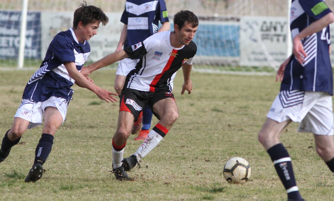 EYES ON THE PRIZE: Leeton United's Pablo Quarin has the ball in his sights during Sunday's clash against Young. Photo: Talia Pattison 