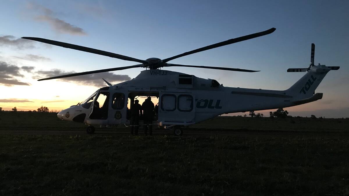 The rescue helicopter on scene at the Colembally bike track on Sunday evening. Photo: NSW Ambulance 
