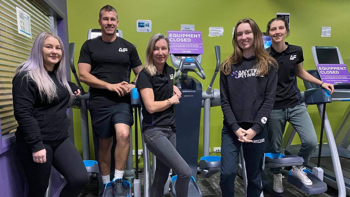 THE TEAM: The staff at Anytime Fitness in Leeton (from left) Farrah Thompson, Kurtis De Paoli, Robyn Brown, Kayla Brown and Nyah Brown are excited to be welcoming members back to the gym. Photo: Talia Pattison 