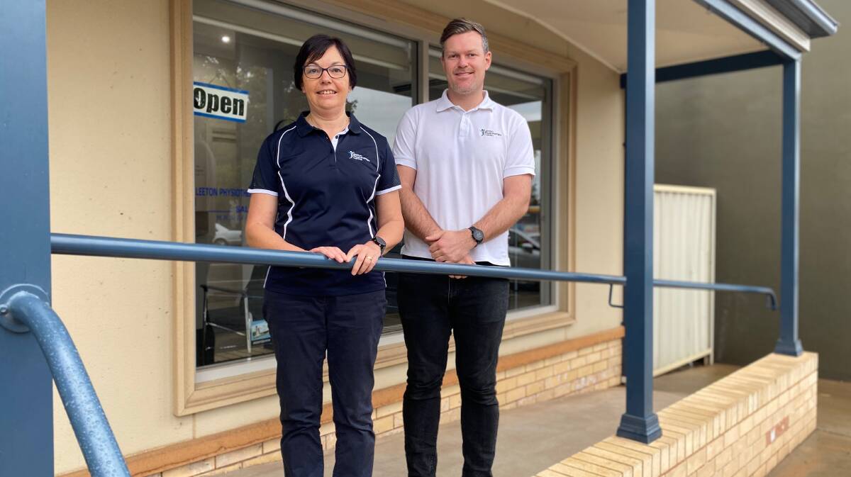 CHANGE: Sally Hill has handed over the keys of Leeton Physiotherapy Centre to Craig Townsend. Photo: Talia Pattison