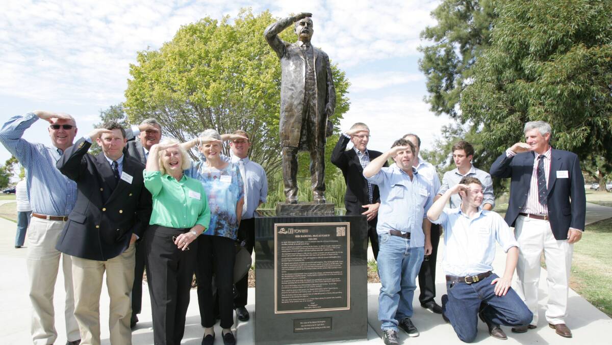 Descendants of Sir Samuel McCaughey with the statue erected in his honour. 