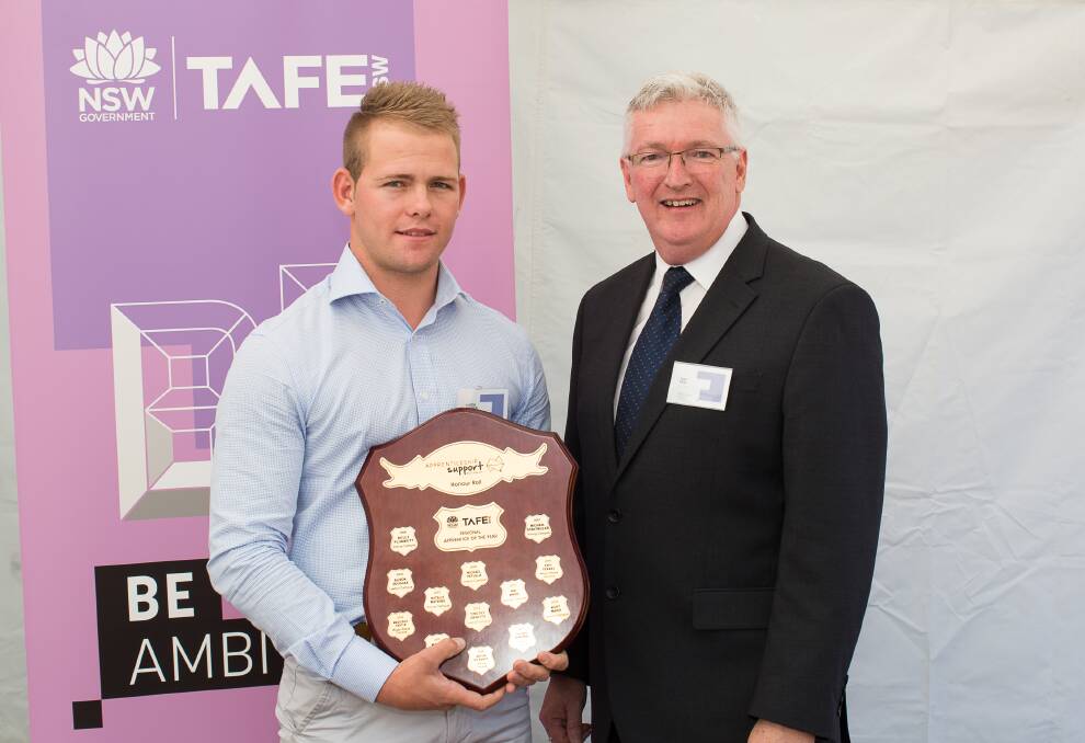 HONOUR: Leeton's Hayden DeMamiel and regional manager apprenticeships support Australia's Tony Kier after he was named the regional apprentice of the year. 