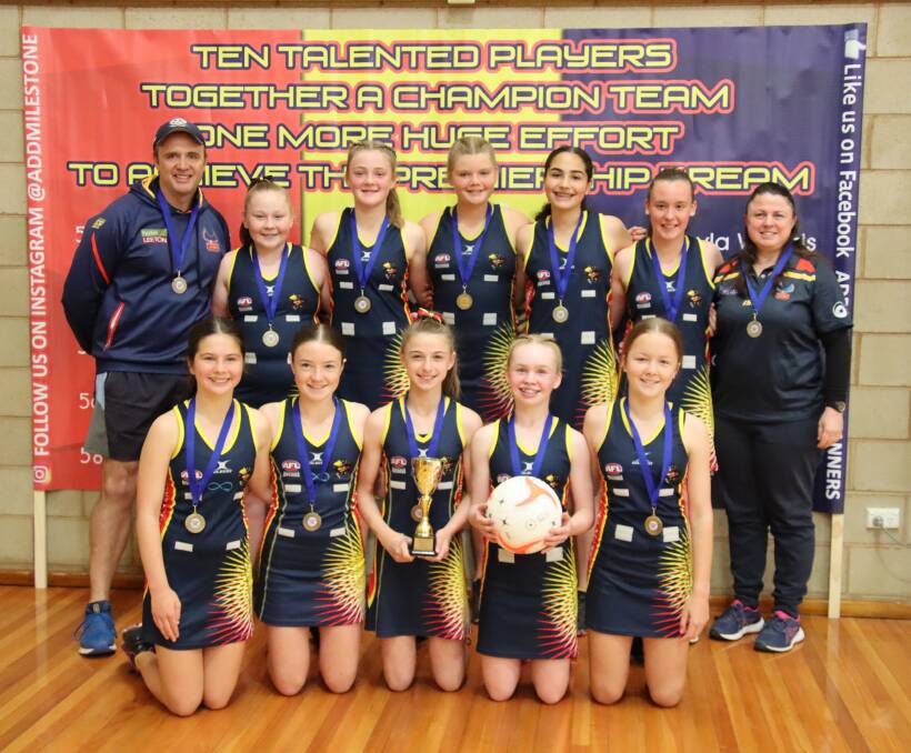 PREMIERS: (Back from left) coach Travis Irvin, Ella Thomas, Amelia Irvin, Brooke Buckley, Annmaree Ciurleo, Zoe De Paoli, manager Monique Looby, (front) Sophie Cross, Taylah Axtill, Emily Looby, Chelsea Purtill and Mikayla Woods.
