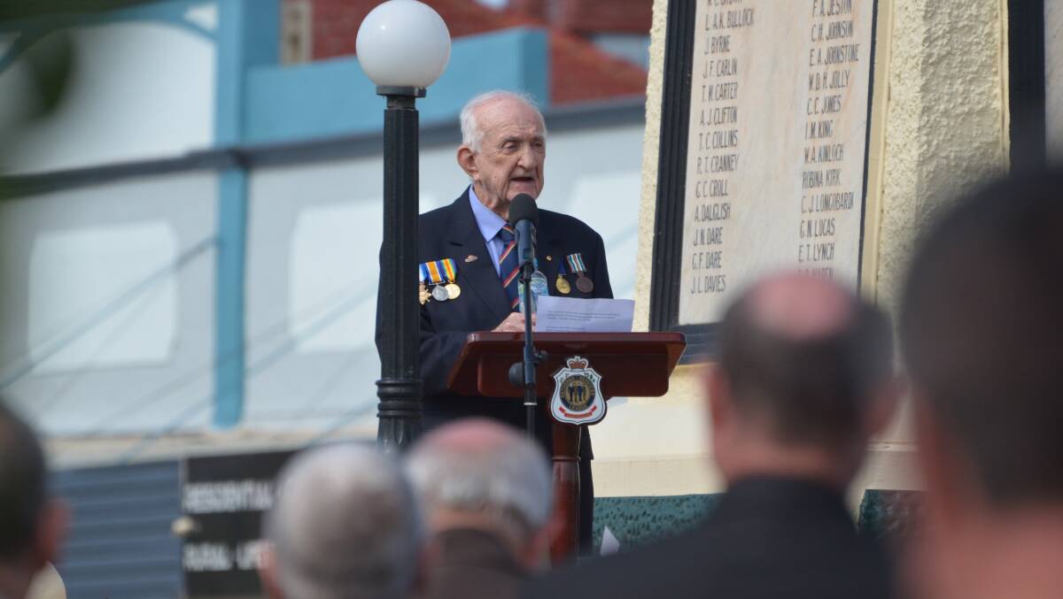 ADDRESS: Retired doctor Rob Byrne addresses the crowd on Anzac Day in Leeton. Photo: Declan Rurenga