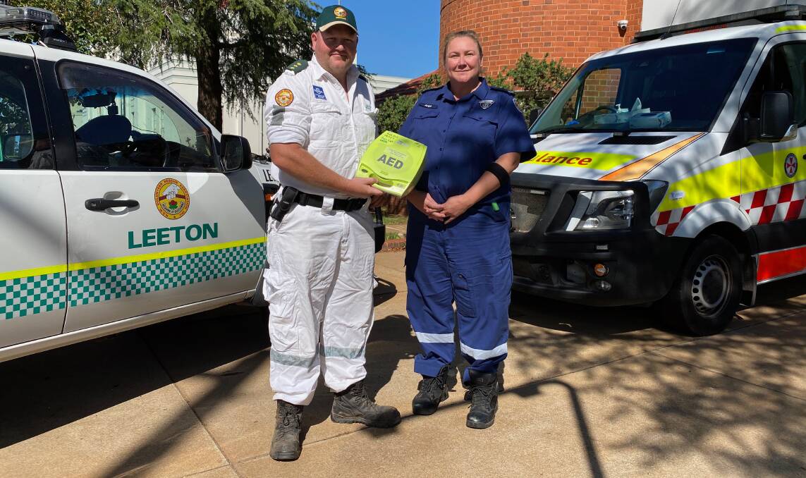 VITAL SUPPORT: Leeton Volunteer Rescue Association's Paul Smith (left) with Leeton station officer Ange Fraser. Photo: Talia Pattison 