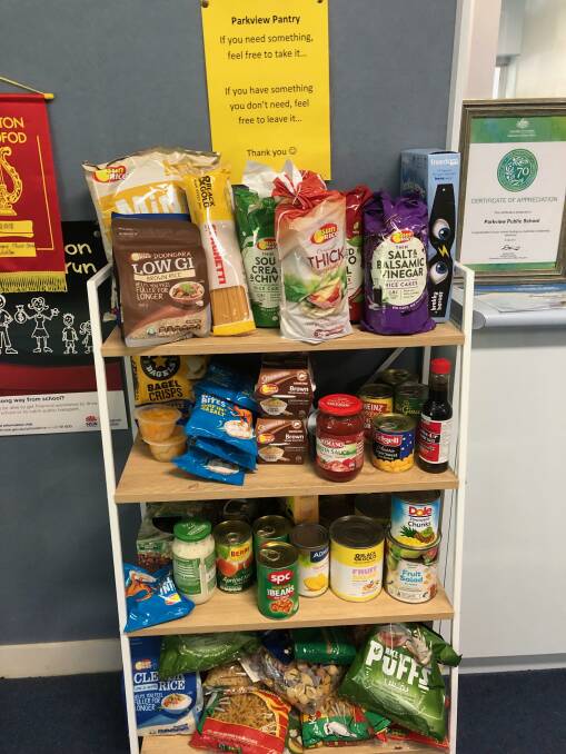 GIVING BACK: The Parkview pantry encourages people to both donate and take what they need, whenever that may be. Photo: Talia Pattison