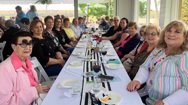 DAY OUT: The group enjoys the high tea in aid of Lilier Lodge. The event raised funds to assist the lodge. Photo: Contributed