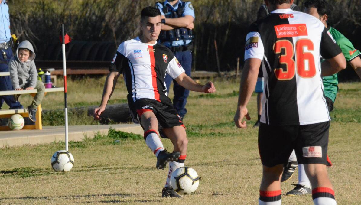 BALL WORK: Nick Trifogli moves the ball for Leeton United during their game against South Wagga last weekend. Photo: Liam Warren