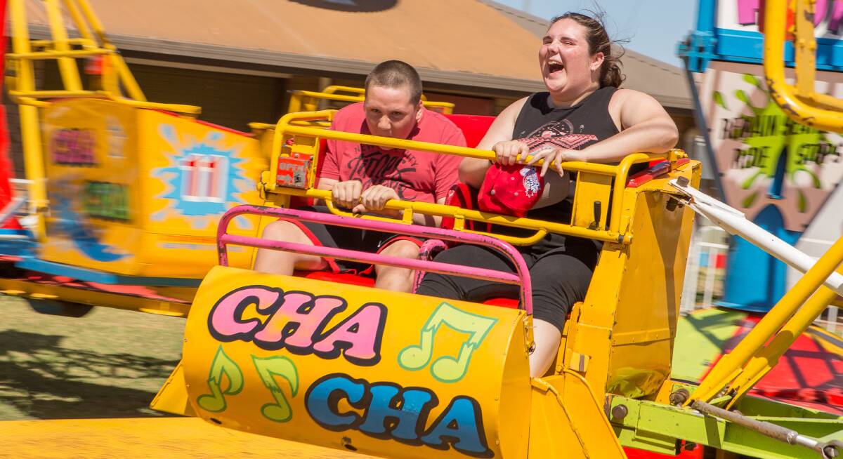 HAPPY: Alison and Jason Moller take a spin on the cha cha at last year's Leeton Show with the delight of the ride clearly evident.
