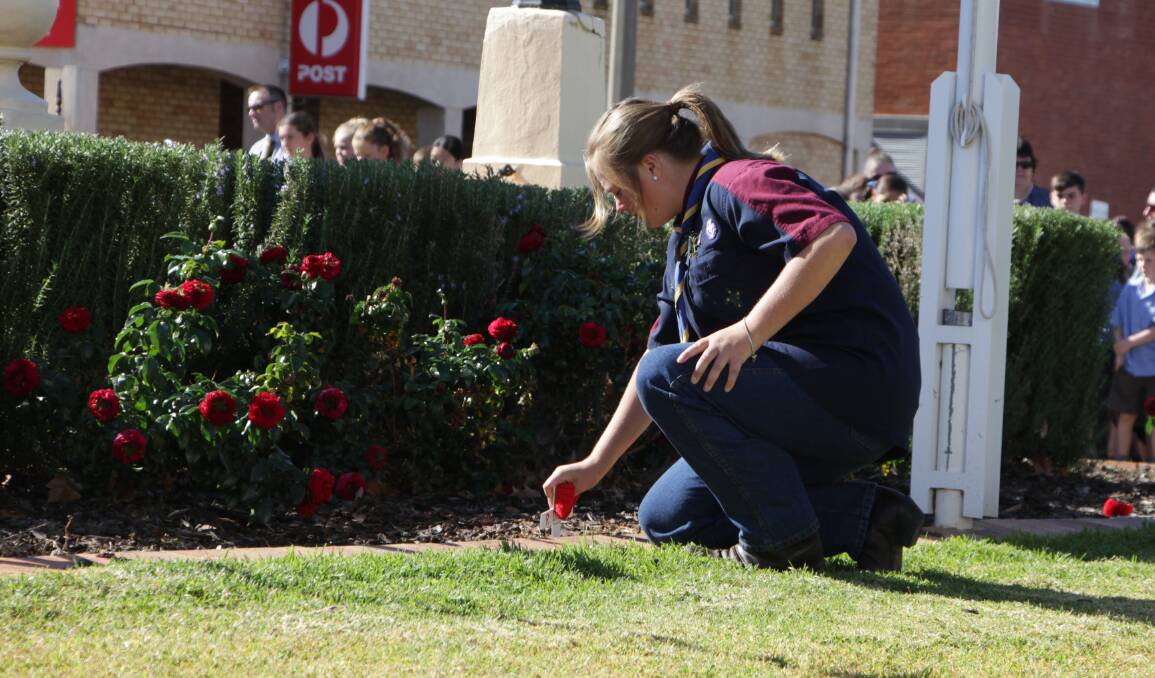 HONOURING SACRIFICE: A poppy is laid at the Cenotaph in remembrance of a soldier from Leeton who gave their life in service of the country.