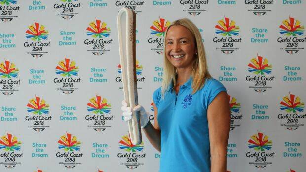 Olympic gold medallist Brooke Hanson with the baton. Picture: GC2018