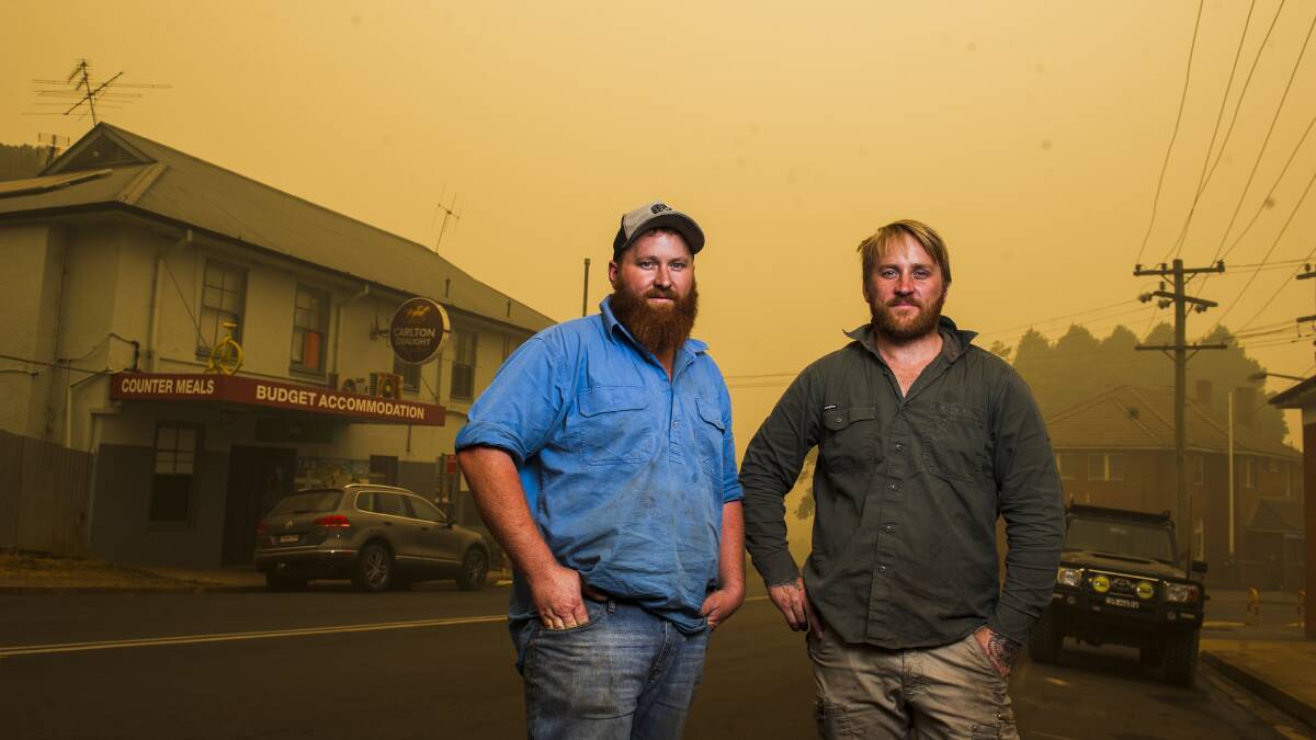 Brad Harvey, and his brother Trent Harvey, were checking on their father's property in Batlow. Picture: Dion Georgopoulos