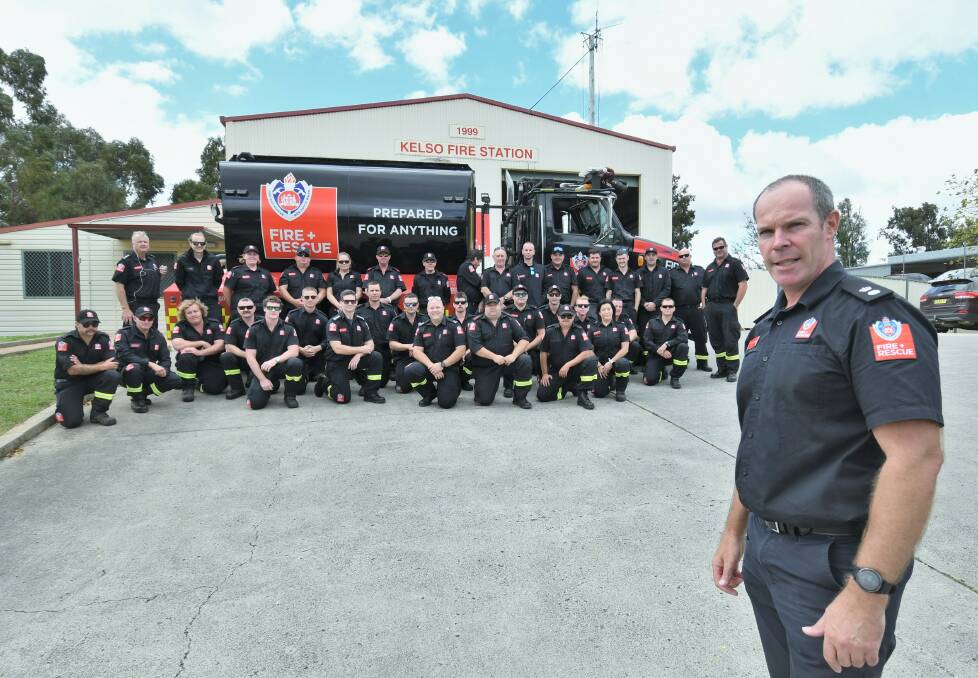 HELP ON THE WAY: NSW Fire and Rescue acting Superintendent Tim Climo with the firefighters going to Port Macquarie. Photo: CHRIS SEABROOK