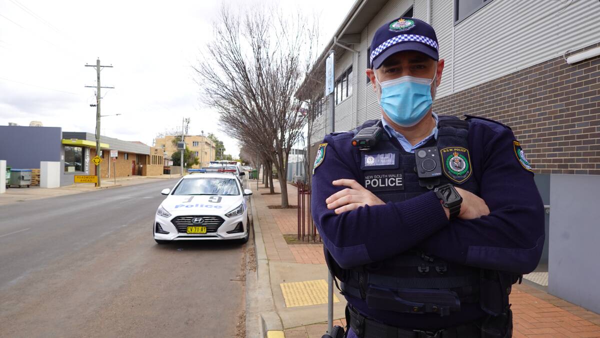 MASK UP: Paul Rosano is among the police officers enforcing 'Operation Stay at Home' across the region this week. PHOTO: Monty Jacka
