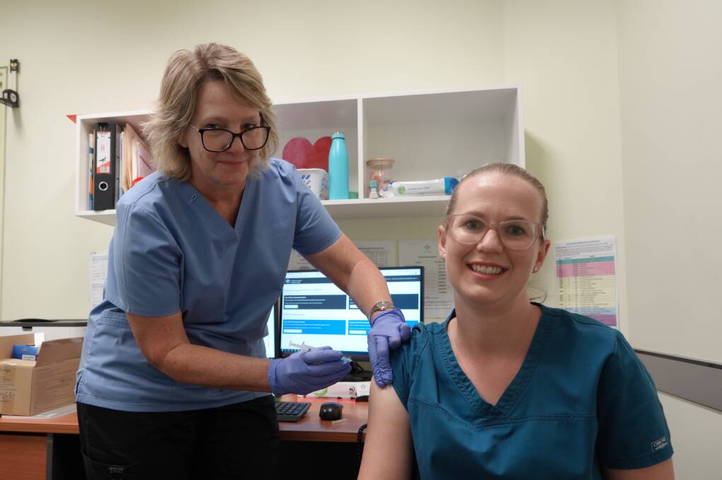 ROLLING UP OUR SLEEVES: Jacqui Mossman administers the Astra Zeneca COVID vaccine to Sarah Jay at the Griffith Vaccination Hub earlier this year. PHOTO: Monty Jacka.