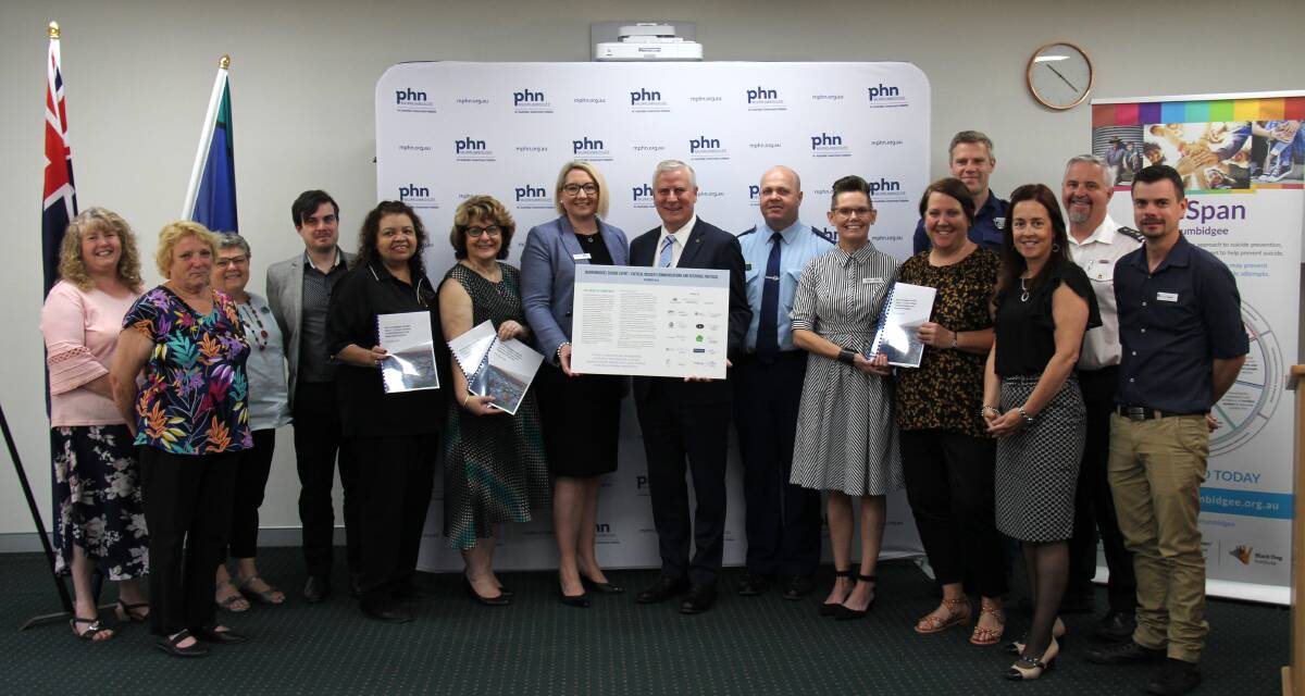 COMMITTED: Members of the Murrumbidgee Suicide Prevention and Postvention group with Deputy Prime Minister Michael McCormack after committing to provide a coordinated approach to suicide prevention and support across the Murrumbidgee Region. PHOTO: Supplied