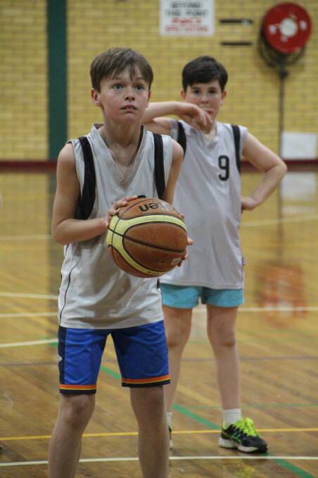 LOCKED IN: Kobe O'Callaghan prepares to shoot a free throw in the last round game of the LBA C Grade boys competition. Kobe plays for Anytime Fitness.