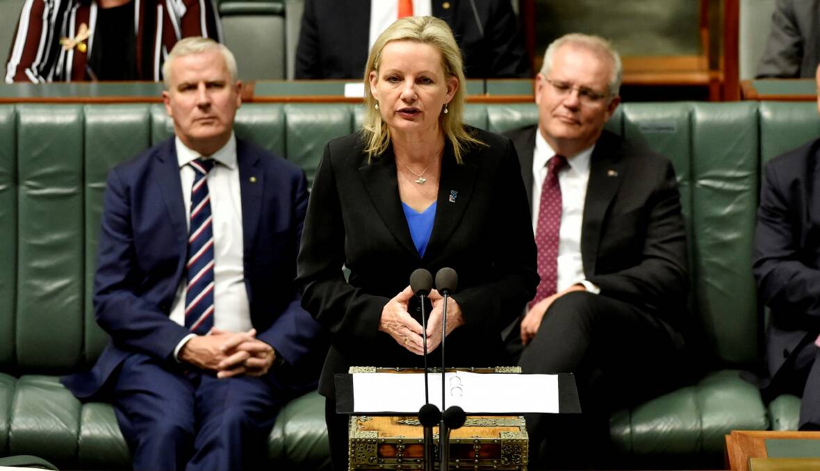 Sussan Ley in the federal parliament with Prime Minister Scott Morrison and Deputy Prime Minister Michael McCormack.