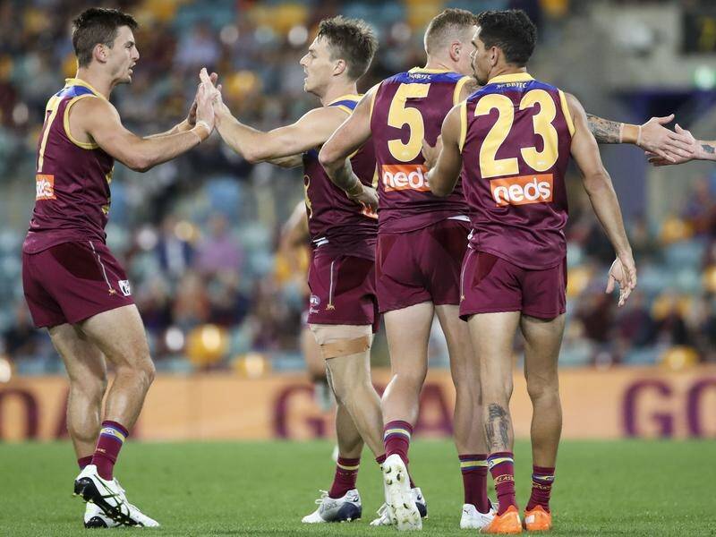 Brisbane defeated Carlton by 17 points at the Gabba to record their seventh consecutive win.