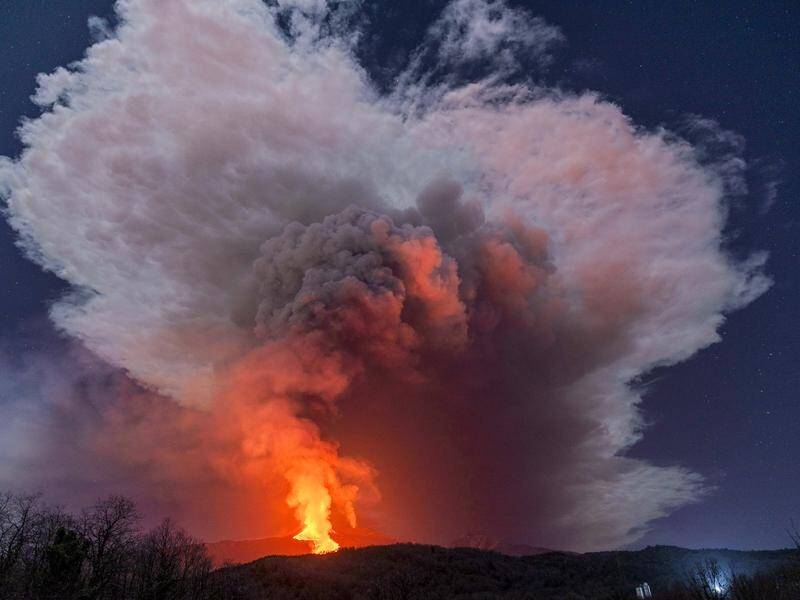 Mount Etna in Sicily has erupted, covering towns with ash and stones.