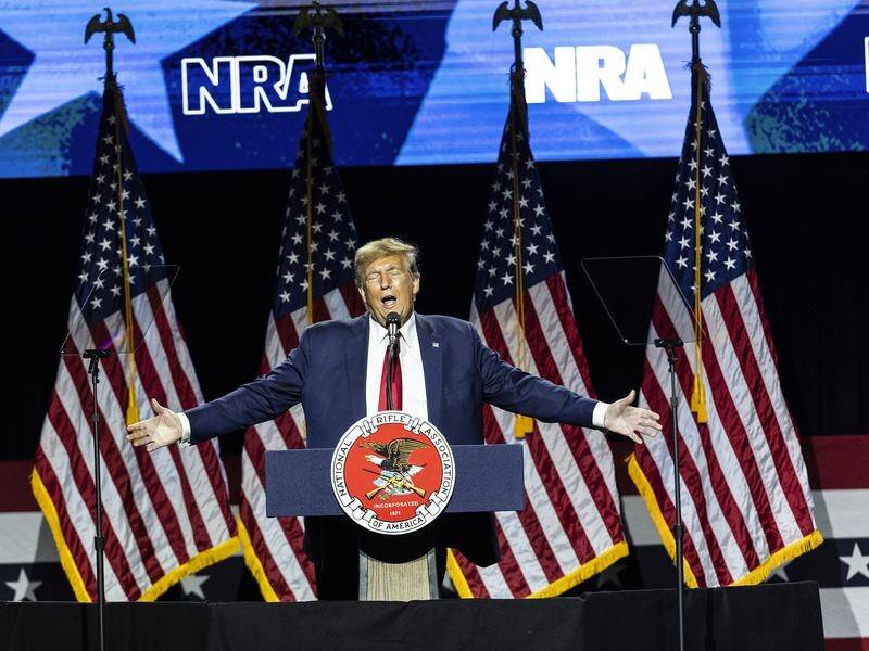 Donald Trump has addressed a crowd of thousands at a National Rifle Association event. (AP PHOTO)