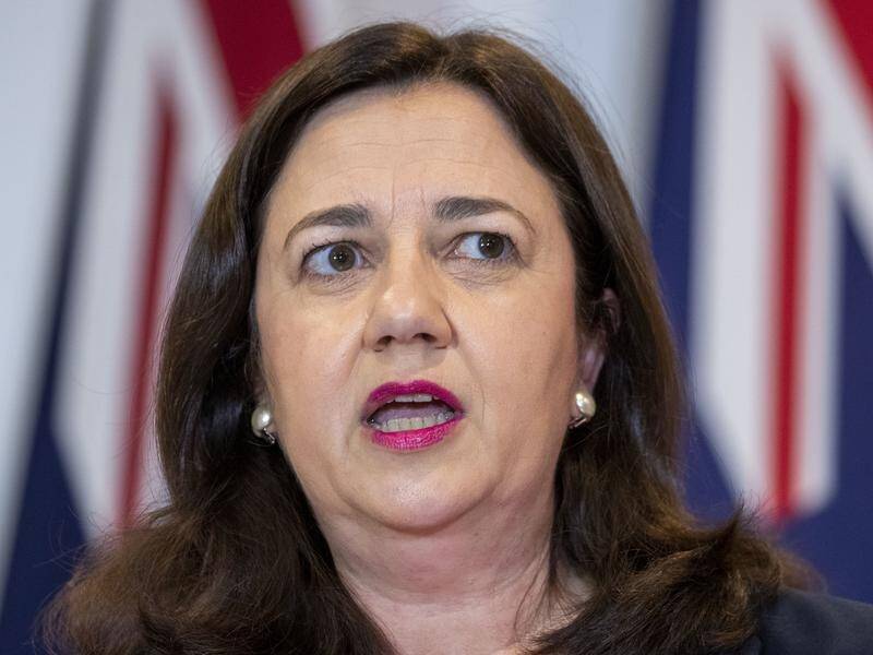 Annastacia Palaszczuk has asked police to investigate the papers of a man who arrived with COVID-19.