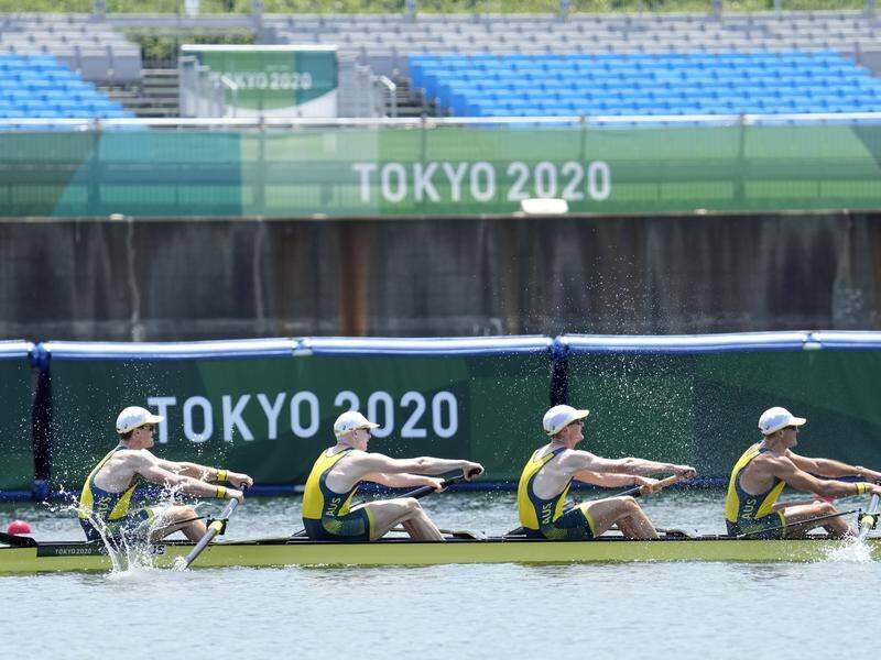 Australia's men's four have held off a late challenge from Romania to win gold at the Olympic Games.