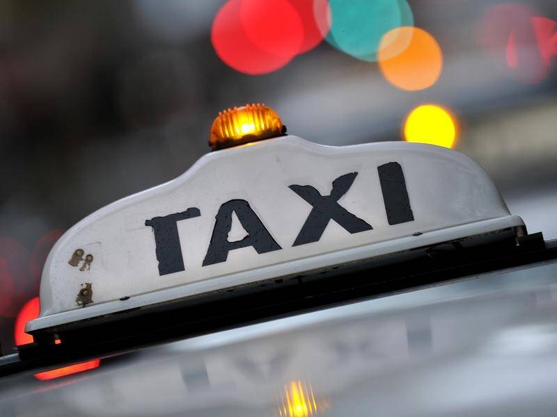 An Adelaide cab driver has been jailed for driving at a man who climbed on his car's roof.