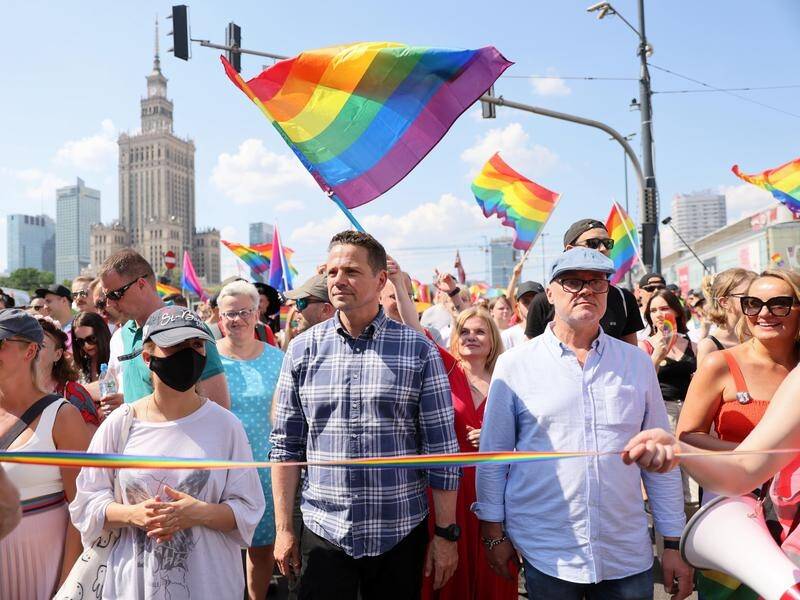 Mayor of Warsaw Rafal Trzaskowski (C) during the Gay Pride parade in Poland.