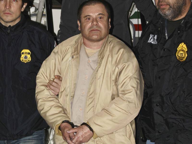 Mexico's president is seeking calm following drug kingpin Joaquin "El Chapo" Guzman's (C) jailing.