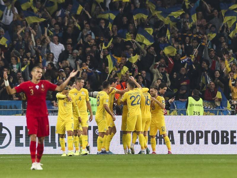 Ukraine players celebrate a goal in their 2-1 win over Portugal in their Euro 2020 qualifier.